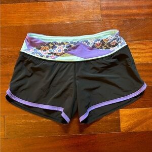 Lululemon Speed Up Low-Rise Lined 4”. Size: 8. Color: Black w/ Purple/Pink.